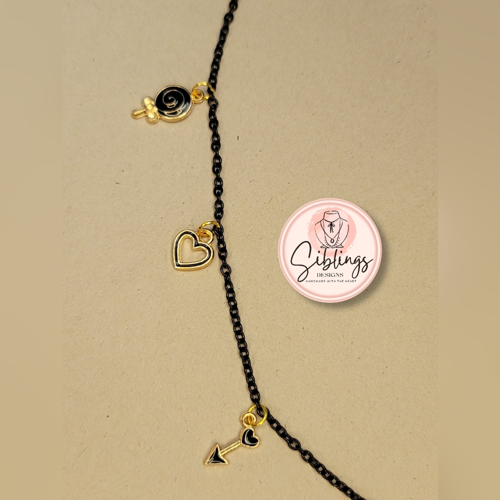 Necklace with black and golden charms - Picture 3 of 6